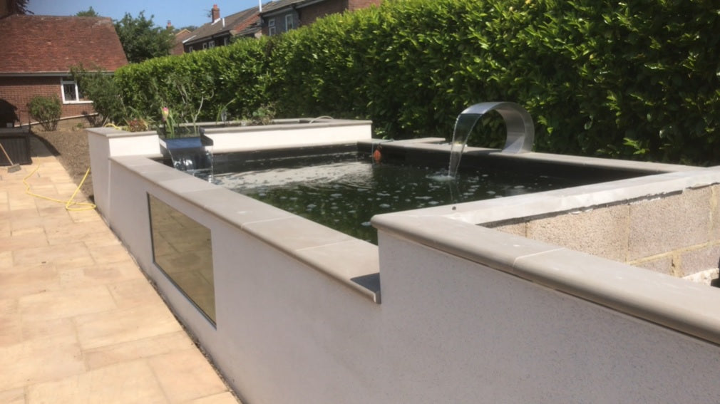 Raised pond with viewing window - completed