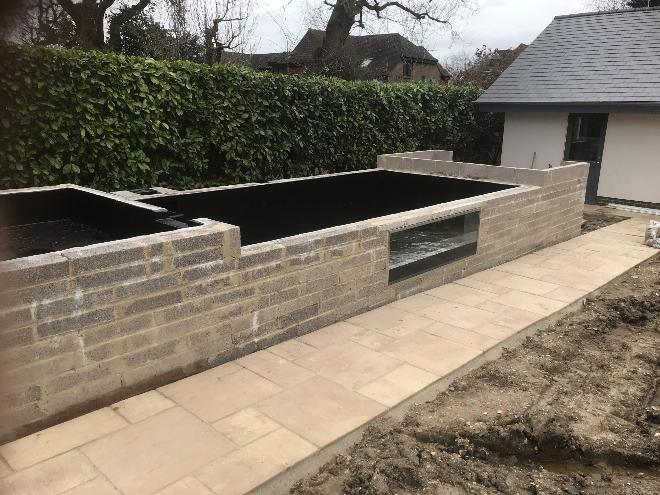 Raised pond with viewing window - final result